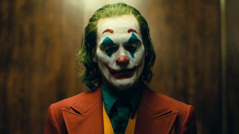 Joaquin Phoenix como Coringa