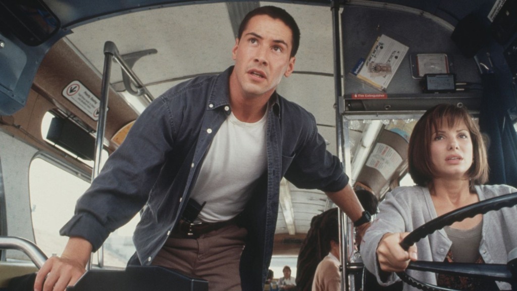 Keanu Reeves e Sandra Bullock em Velocidade Máxima